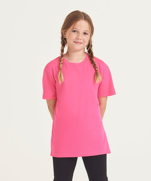 Young girl wearing a pink t-shirt on a white background